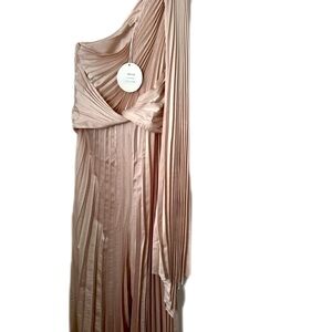 Champagne colored special event jumper. Fits beautifully.